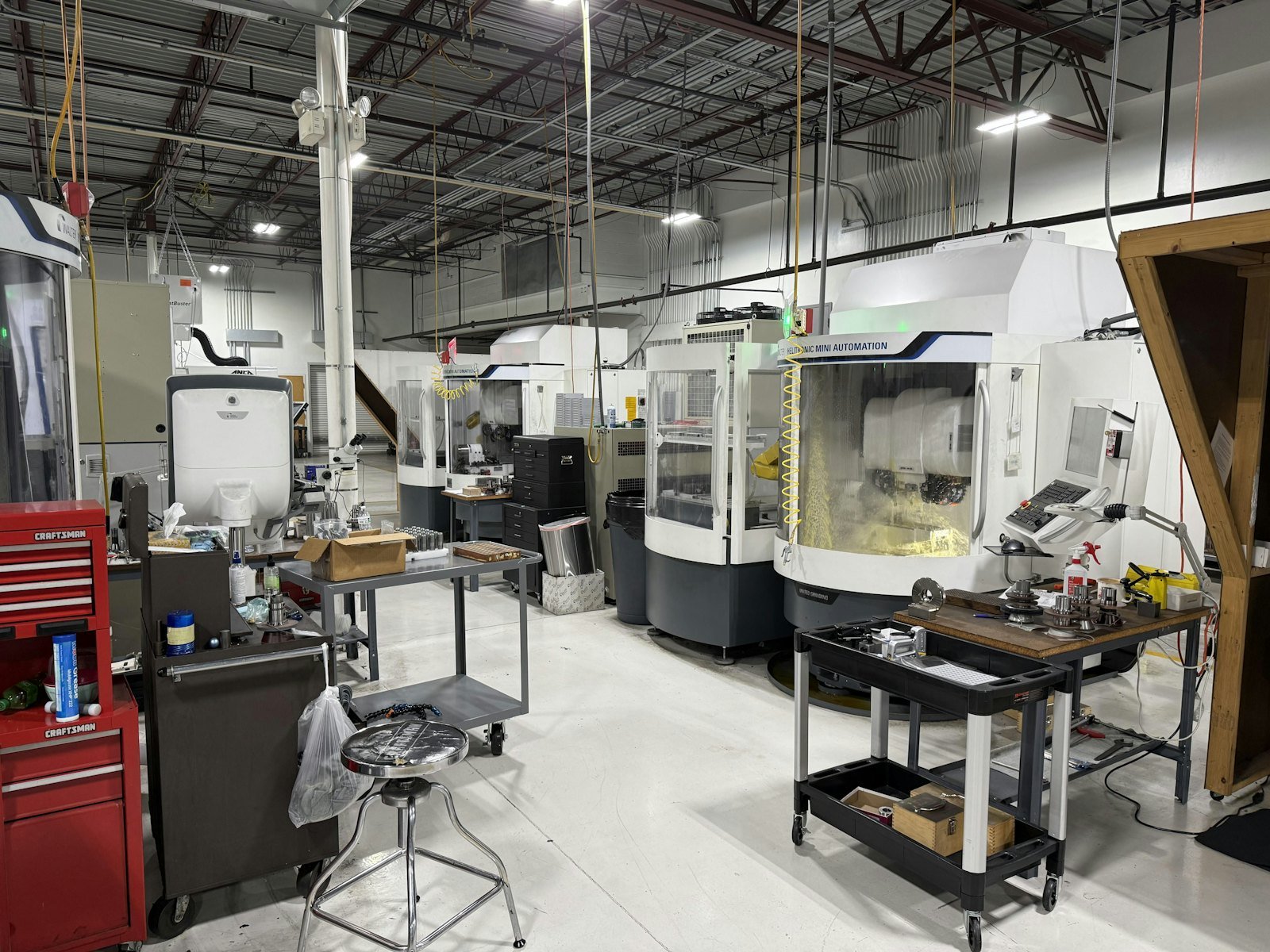 CNC machines in a bright metalworking workshop